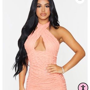 BRAND NEW Bodycon Cross Front Dress. Orangish/pink color